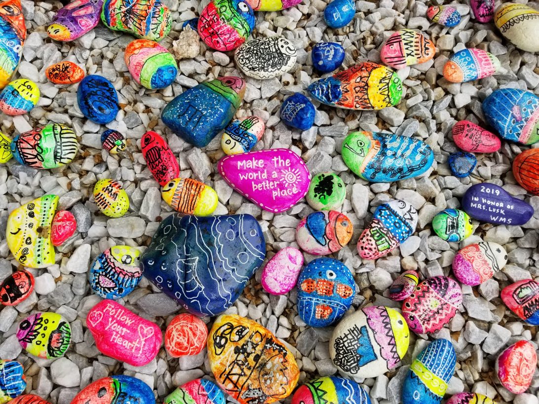 kind messages painted onto colourful rocks
